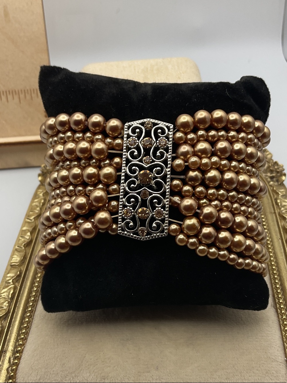 Gold Pearl Multi-Strand Bracelet with Decorative Filigree Centerpiece